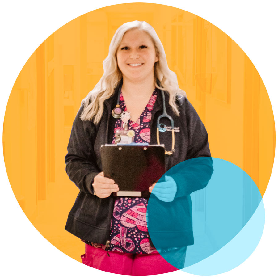 Nurse walking with clipboard